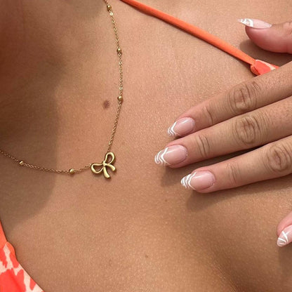 Gold Lacy Bow Necklace